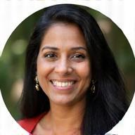 Portrait of Priya L., a satisfied Timeless Trails customer.